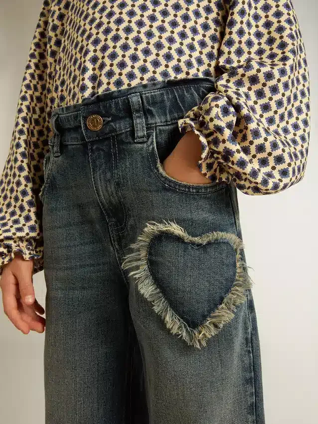 Pantalones de mezclilla de pierna ancha para niñas en azul