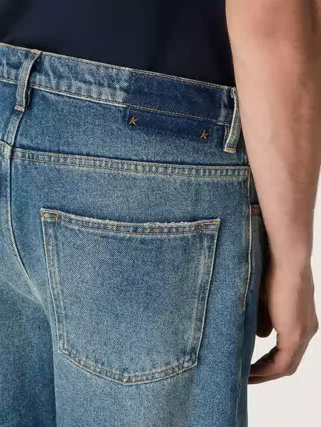 Pantalones de mezclilla holgados de lavado medio azul