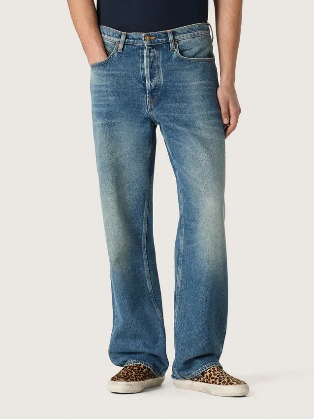 Pantalones de mezclilla holgados de lavado medio azul
