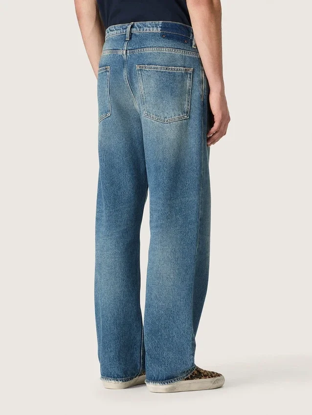 Pantalones de mezclilla holgados de lavado medio azul