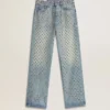 Pantalones de mezclilla lavados para mujer con ojales en toda la prenda