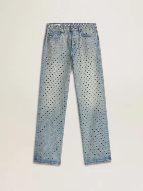 Pantalones de mezclilla lavados para mujer con ojales en toda la prenda