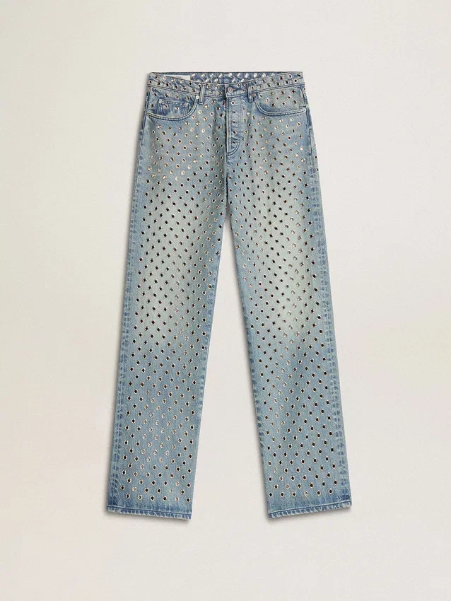 Pantalones de mezclilla lavados para mujer con ojales en toda la prenda
