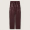 Pantalones de mezclilla para mujer en denim color burdeos con cristales degradados