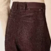 Pantalones de mezclilla para mujer en denim color burdeos con cristales degradados
