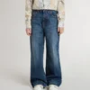 Pantalones de mezclilla para niñas con corte acampanado, lavado medio y bordados