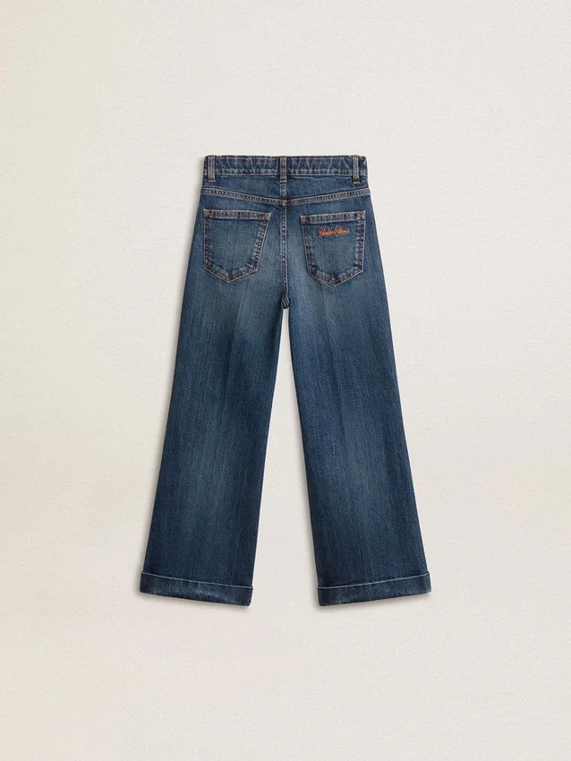 Pantalones de mezclilla para niñas con corte acampanado, lavado medio y bordados