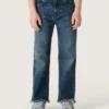 Pantalones de mezclilla para niños con bordes sin rematar y bordado
