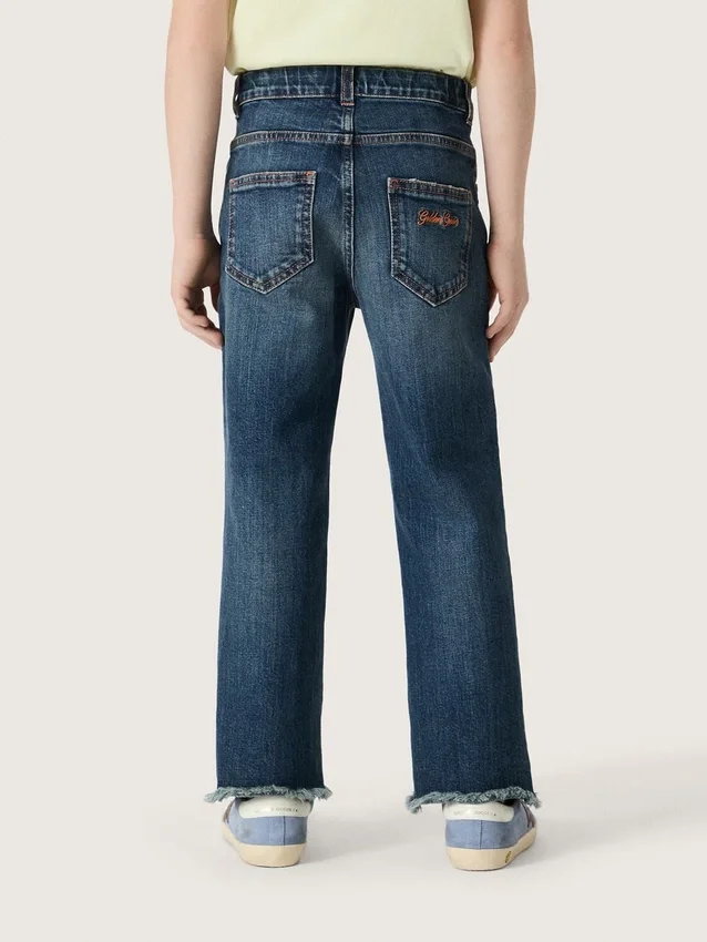 Pantalones de mezclilla para niños con bordes sin rematar y bordado