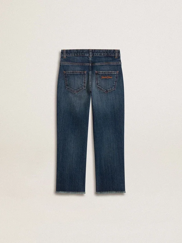 Pantalones de mezclilla para niños con bordes sin rematar y bordado