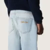 Pantalones de mezclilla para niños Golden en denim azul claro con logotipo bordado