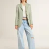 Pantalones de mujer en denim con efecto desgastado