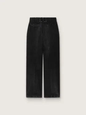 Pantalones de mujer en denim de algodón negro con acabado desgastado