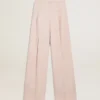 Pantalones de mujer en tela de lana entallada de color rosa