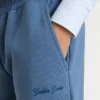 Pantalones deportivos azules para niños con bordado