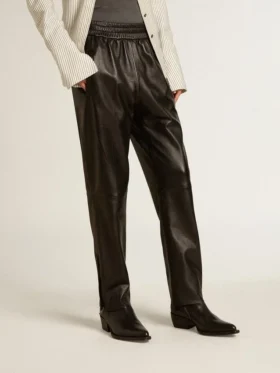Pantalones deportivos negros de piel napa con cremallera en la parte inferior