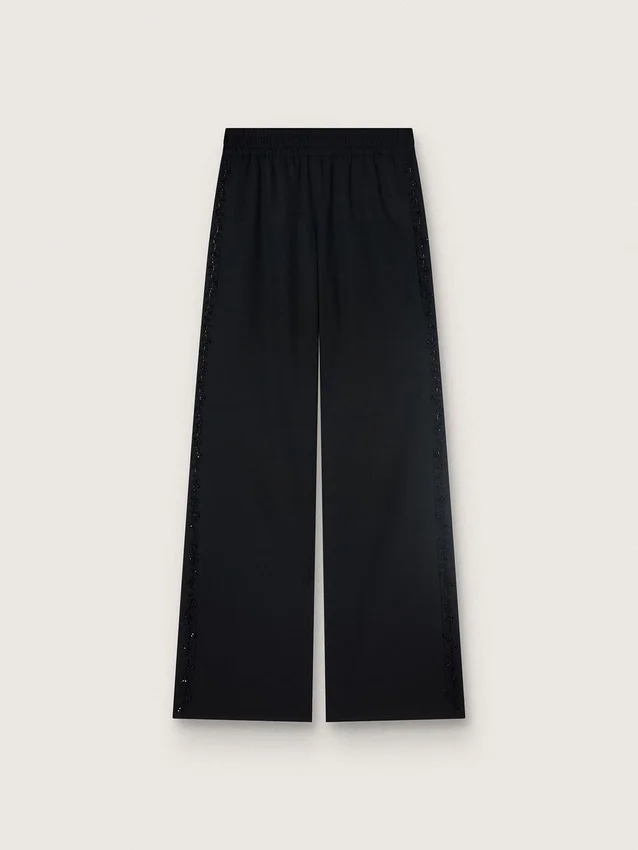 Pantalones deportivos para mujer en sarga de lana negra con bordado de lentejuelas