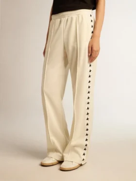 Pantalones joggers blancos para mujer con estrellas en los costados