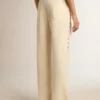Pantalones joggers blancos para mujer con estrellas en los costados