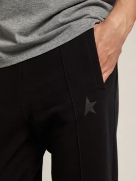 Pantalones joggers negros para hombre con estrella en el frente