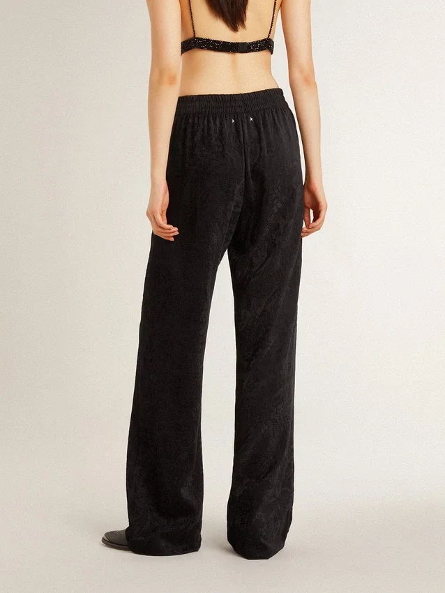 Pantalones joggers negros para mujer con estampado toile de jouy tono sobre tono