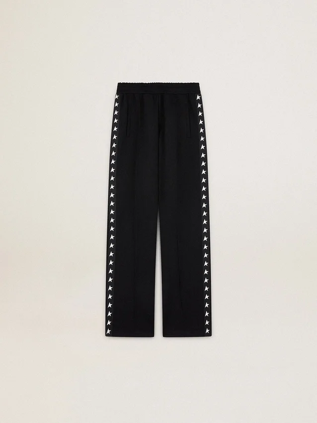 Pantalones joggers negros para mujer con estrellas blancas en los costados