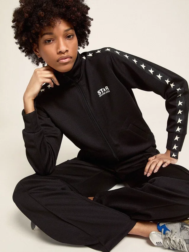 Sudadera negra con cremallera para mujer con estrellas blancas