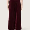 Pantalones para niñas de color burdeos con efecto terciopelo y bolsillo trasero