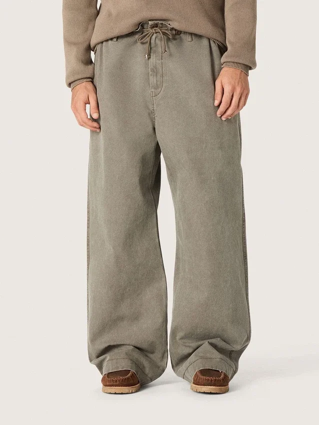 Pantalones unisex de mezclilla gris con cordón y estrella
