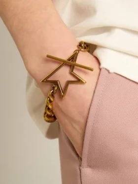 Pulsera de cadena decreciente en oro antiguo con cierre en forma de estrella