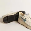 Running Sole en napa con estrella de cuero azul e inserto de gamuza