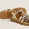 Sandalias Maxime Junior en cuero dorado