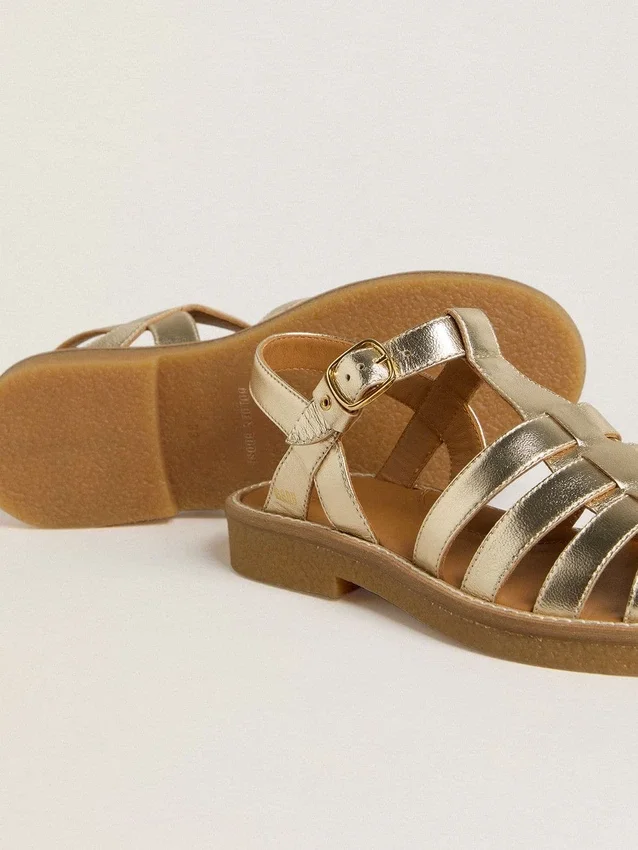Sandalias Maxime Junior en cuero dorado