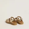 Sandalias Maxime Junior en cuero dorado
