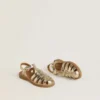 Sandalias Maxime Young en cuero dorado