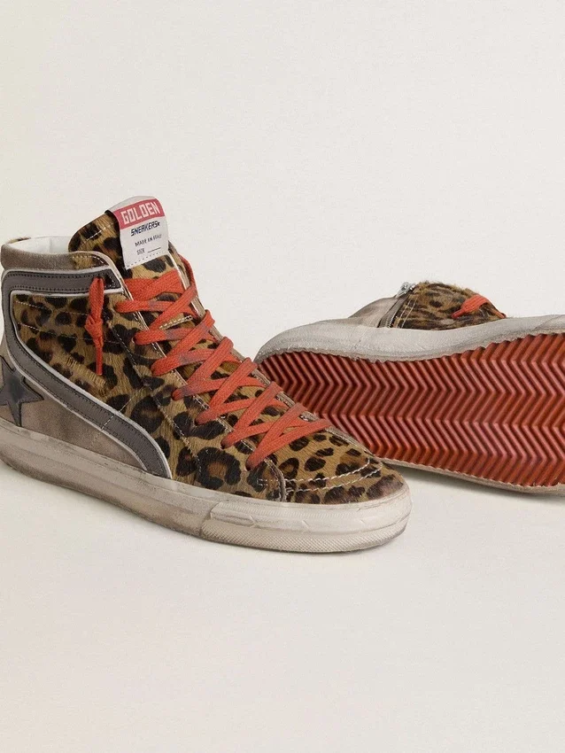 Sandalias Slide LTD para mujer en piel de potro con estampado de leopardo, estrella de cuero metalizado y detalles brillantes
