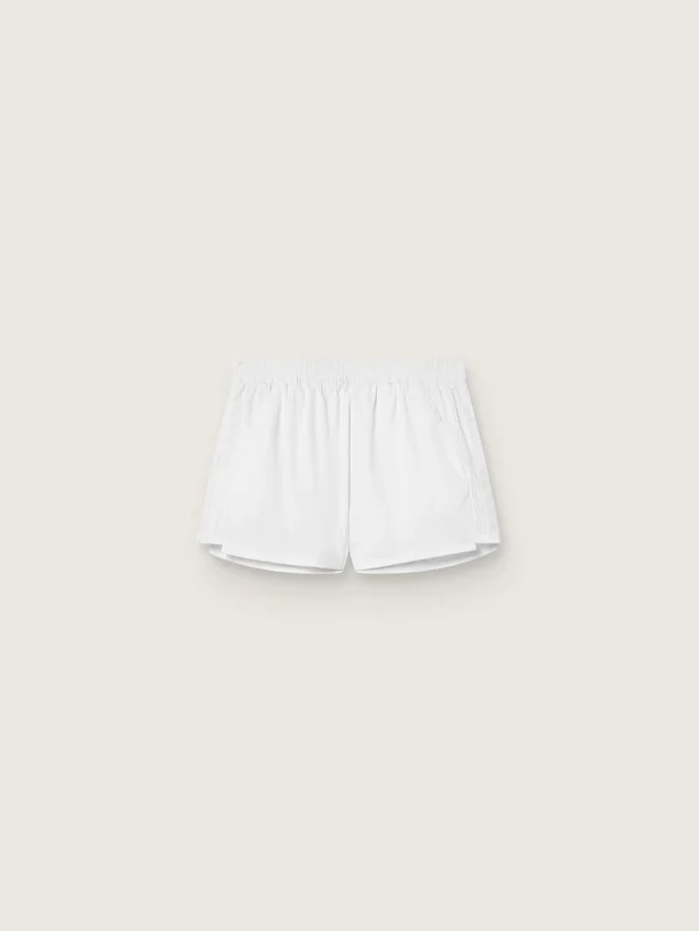 Shorts deportivos blancos de doble capa para mujer