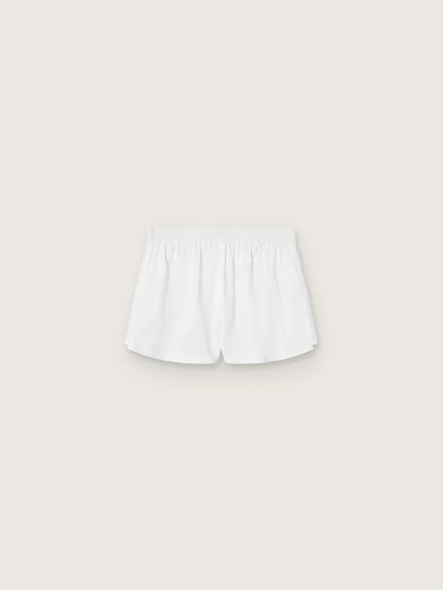 Shorts deportivos blancos de doble capa para mujer