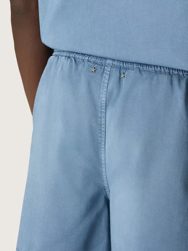Shorts unisex de sarga de algodón azul claro