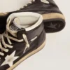 Sky-Star en cuero napa negro con estrella de cuero blanco