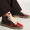 Sky-Star para hombre en cuero negro brillante con estrella roja