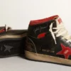 Sky-Star para hombre en cuero negro brillante con estrella roja