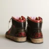 Sky-Star para hombre en cuero negro brillante con estrella roja