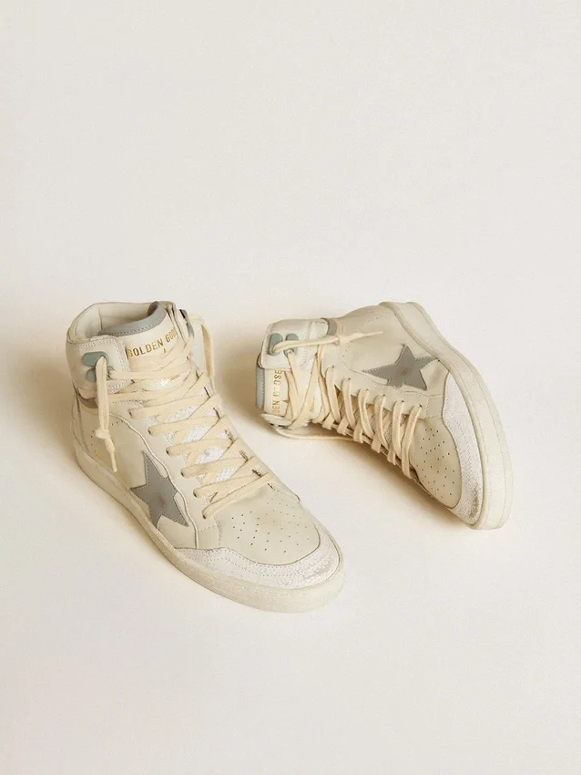 Sky-Star para mujer en cuero con estrella de cuero azul claro y lengüeta blanca en el talón
