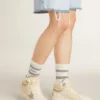 Sky-Star para mujer en cuero con estrella de cuero azul claro y lengüeta blanca en el talón