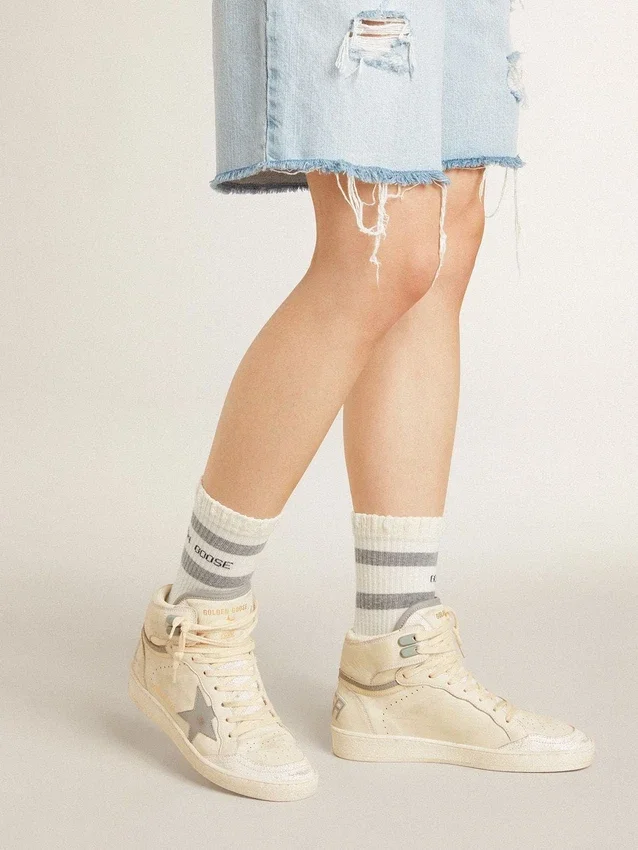 Sky-Star para mujer en cuero con estrella de cuero azul claro y lengüeta blanca en el talón
