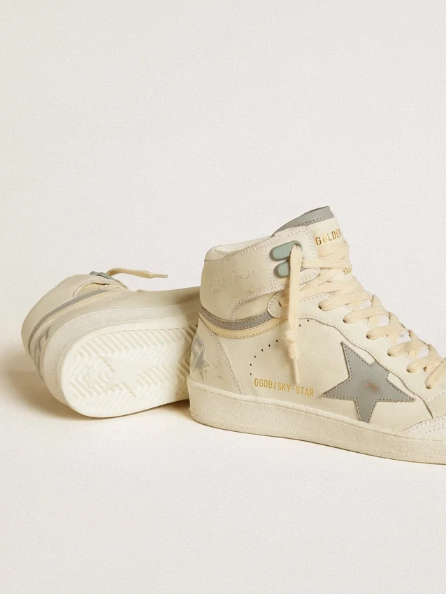 Sky-Star para mujer en cuero con estrella de cuero azul claro y lengüeta blanca en el talón