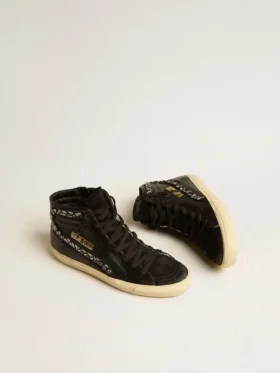 Slide de cuero con estrella negra y detalles de cristales Swarovski