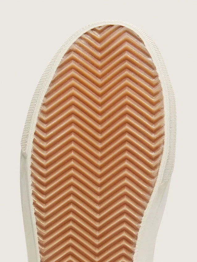 Slide para mujer de cuero blanco con estrella plateada con purpurina y detalle de cuero rosa