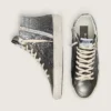 Slide para mujer en negro y purpurina plateada con estrella de cuero y detalles metálicos